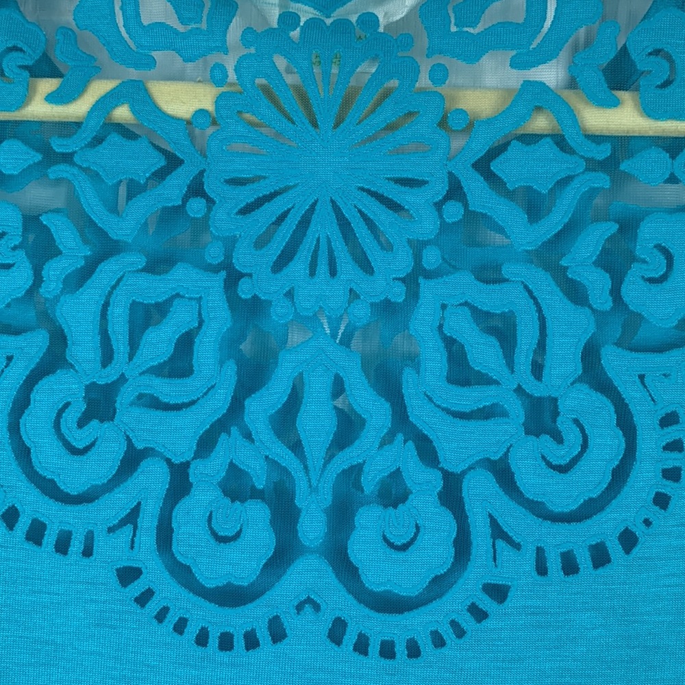 C. Wonder bright teal colored short sleeved top size medium. - Picture 8 of 8